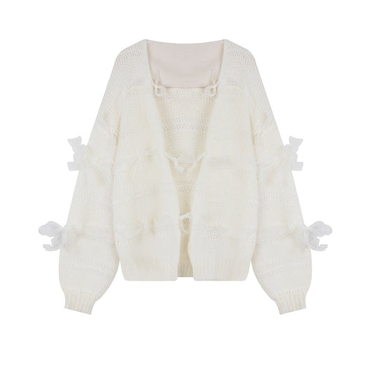 Elegant bowed oversized wool sweater